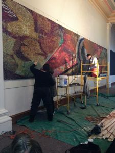 Re-installing the mural at CAPA